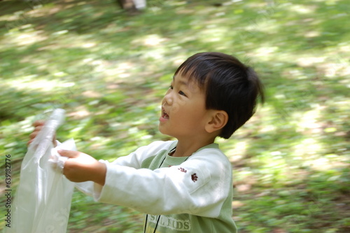 Plum picking boy （梅もぎをする子供）