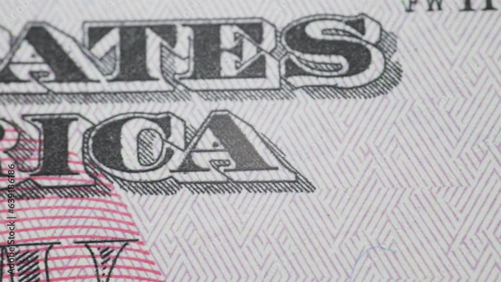 bitcoin coins lie on a dollar bill close-up bitcoin coins lie on a dollar bill close-up