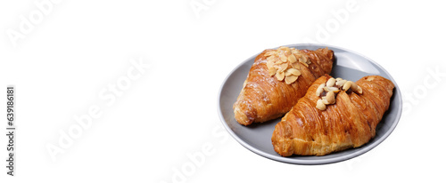 Almond croissants in a plate on a white background with space for text