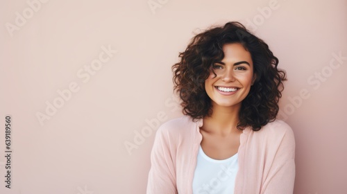 portrait of a Happy woman standing in front of wall