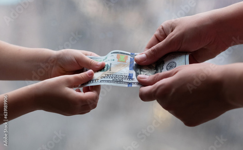 hand with money give money to a child  money for children pocket money