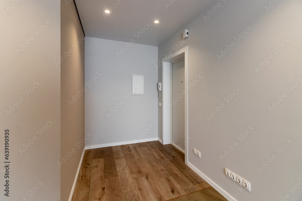 The interior of an empty modern apartment in bright colors immediately after renovation The interior of an empty modern apartment in bright colors immediately after renovation