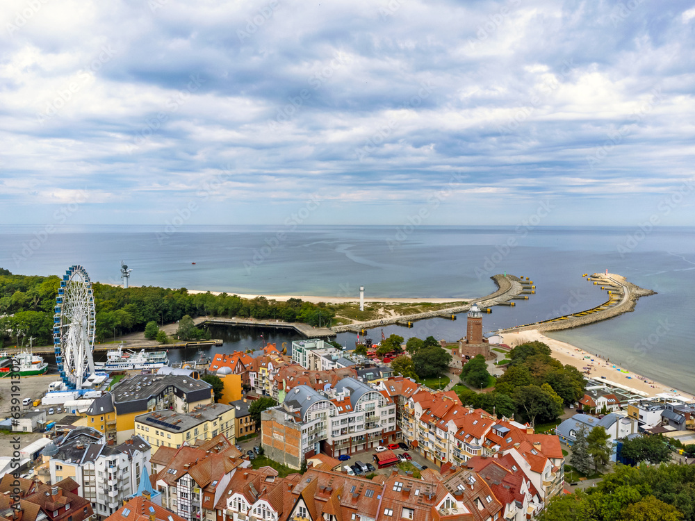 Aerial view landscape, drone view of Kolobrzeg. Beach, sand, Baltic sea, nature, city.