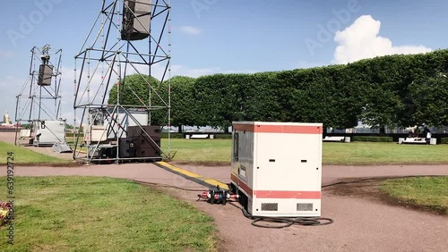 Electricity generator diesel portable uninterruptible power supply for equipment for filming a movie, theater, scenes, events on the street.