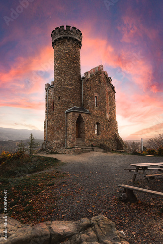 Stunning little castle near city of Karpacz in Poland. Prince Henryk Castle is located in village called Staniszów. Lovely small castle during the sunset in autumn. Gorgeous polish landscape and tones photo