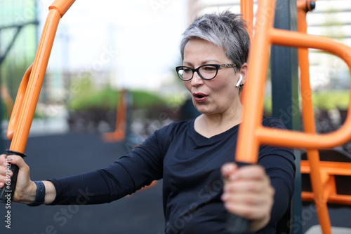 Confident senior woman enjoys outdoor exercise. Embracing an active lifestyle, she radiates health and happiness.