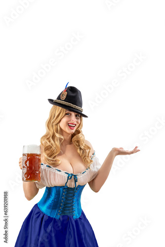 Oktoberfest girl waitress pointing arm at empty copy space. Woman in dirndl, tyrolean hat serving big beer mugs, isolated background. Traditional Bavarian, German, Austrian party, autumn festival
