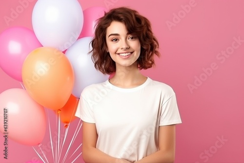 female wearing white tshirt with balloons in background for mock up