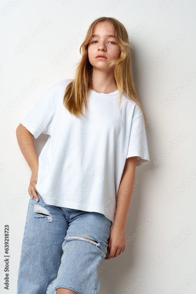 Portrait of young beautiful cute teen girl posing at camera Portrait of young beautiful cute teen girl posing at camera