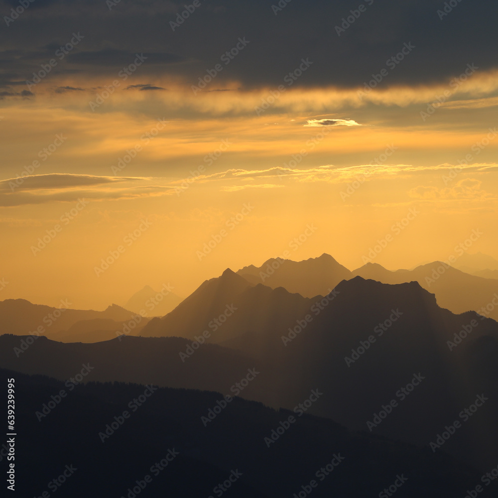Outlines of Augstmatthorn, Tannhorn and Brienzer Rothorn at sunrise.