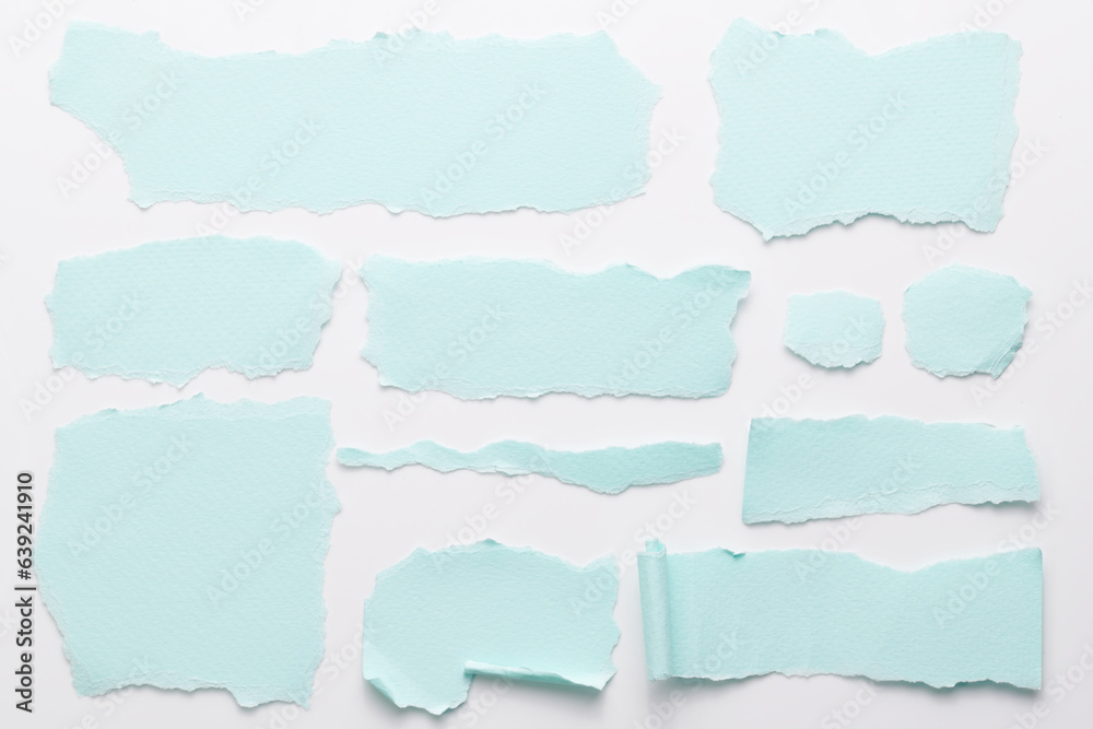 Art collage of pieces of ripped paper with torn edges. Sticky notes collection blue colors, shreds of notebook pages. Abstract background. Art collage of pieces of ripped paper with torn edges. Sticky notes collection blue colors, shreds of notebook pages. Abstract background.