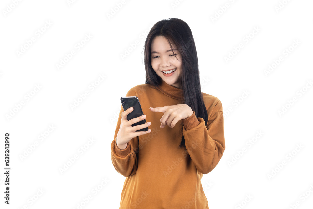 Portrait of a smiling casual Asian woman holding smartphone isolated on white background with clipping path. Portrait of a smiling casual Asian woman holding smartphone isolated on white background with clipping path.