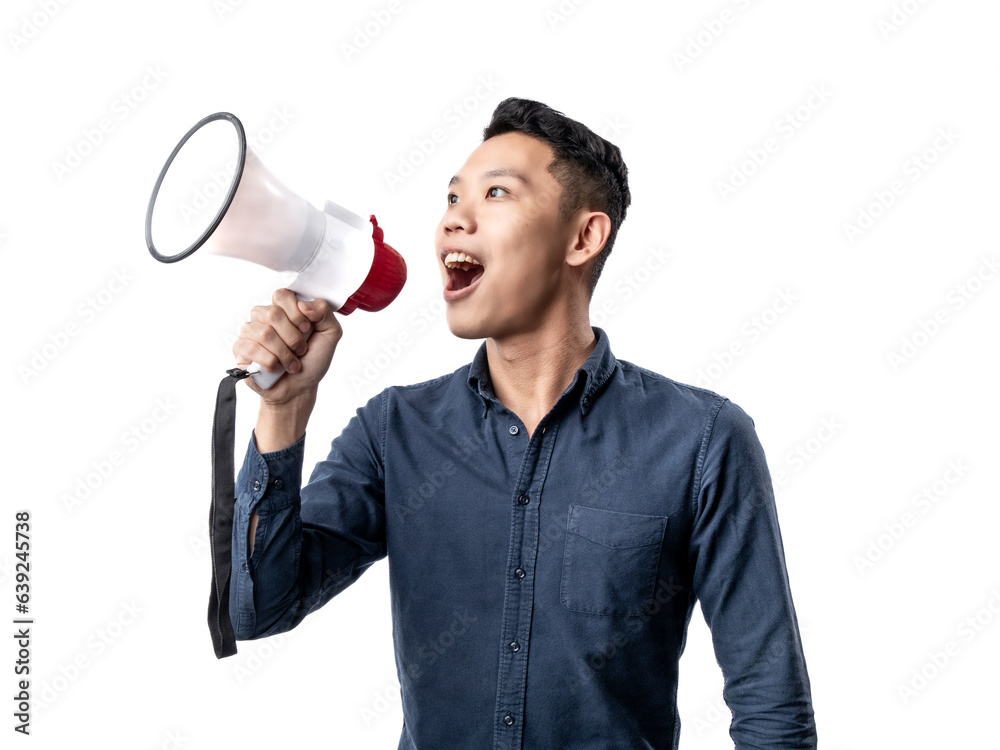 A portrait of an Asian man wearing a blue shirt, holding a megaphone and shouting. Isolated with a white background. A portrait of an Asian man wearing a blue shirt, holding a megaphone and shouting. Isolated with a white background.