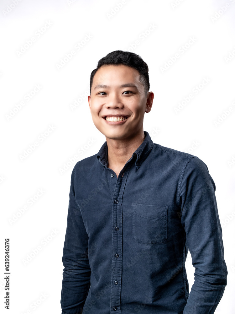 A portrait of an Asian man wearing a blue shirt, standing in a confident pose. Isolated with a white background. A portrait of an Asian man wearing a blue shirt, standing in a confident pose. Isolated with a white background.