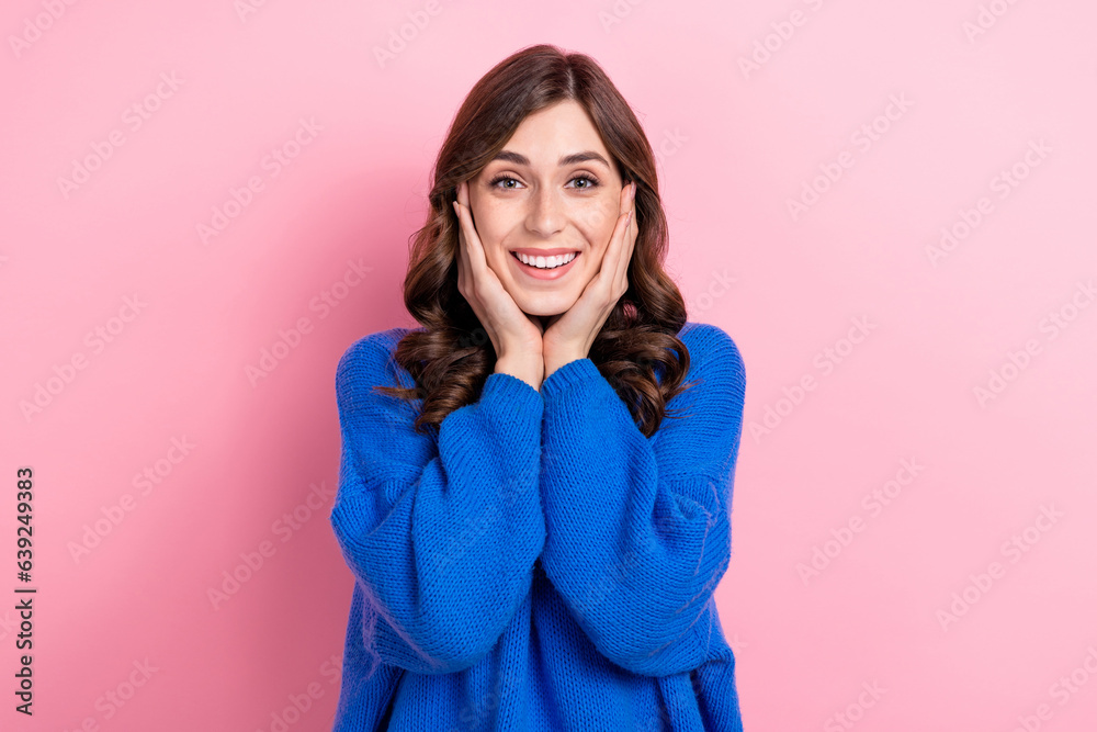 Photo of overjoyed cute girlfriend dressed blue clothes two arm touch cheekbones unexpected good news isolated on pink color background Photo of overjoyed cute girlfriend dressed blue clothes two arm touch cheekbones unexpected good news isolated on pink color background