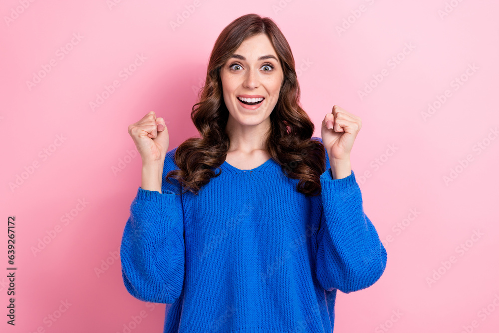 Photo of overjoyed glad lady girl wear blue stylish clothes raise hands rejoice good news win lottery isolated on pink color background Photo of overjoyed glad lady girl wear blue stylish clothes raise hands rejoice good news win lottery isolated on pink color background