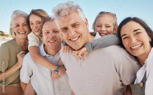 Portrait, bonding and big family on beach together, smile and summer vacation travel to tropical island. Men, women and children on happy ocean holiday with grandparents, parents and kids in Bali.