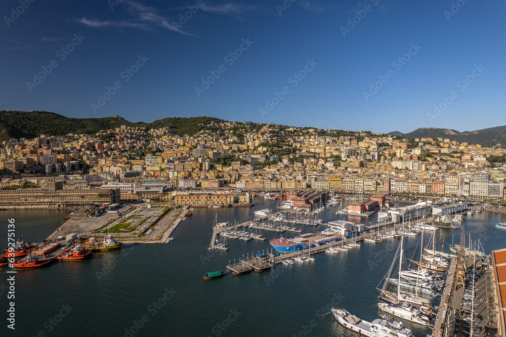 The drone aerial view of Genova port and the downtown district, Italy. Genoa is a city in and the capital of the Italian region of Liguria. 