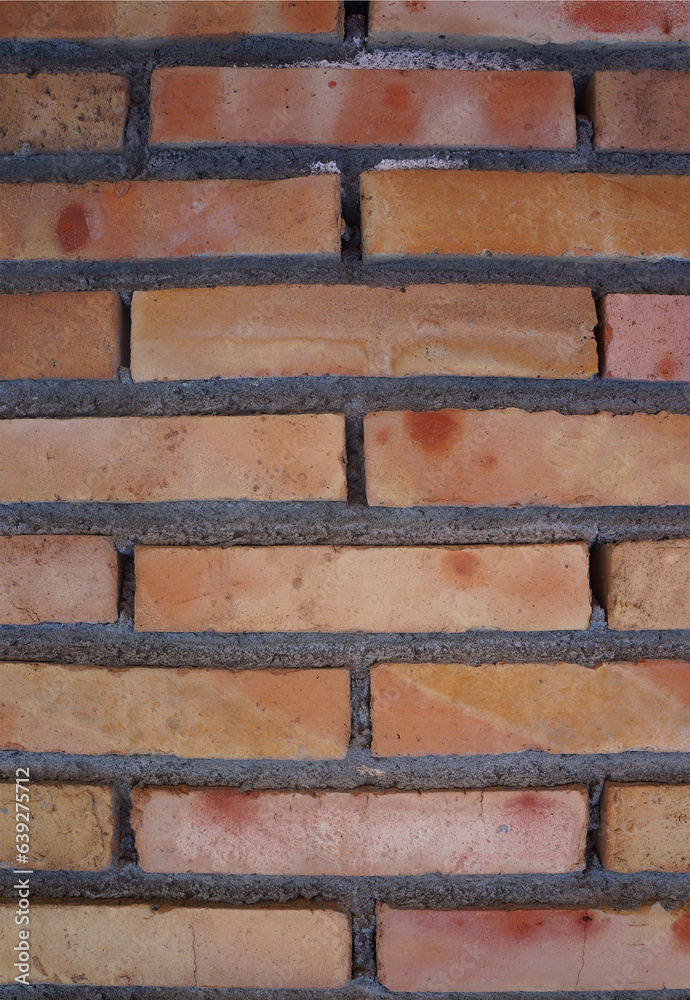 Fototapeta premium Red brick wall background texture close up