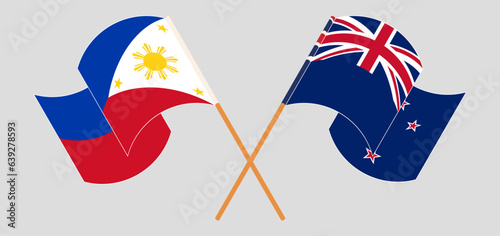 Crossed and waving flags of the Philippines and New Zealand