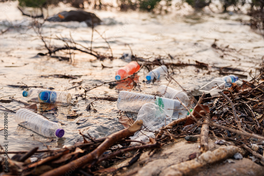 plastic bottles are floating in sea. concept : Environmental problem of plastic rubbish pollution in ocean. plastic bottles are floating in sea. concept : Environmental problem of plastic rubbish pollution in ocean.