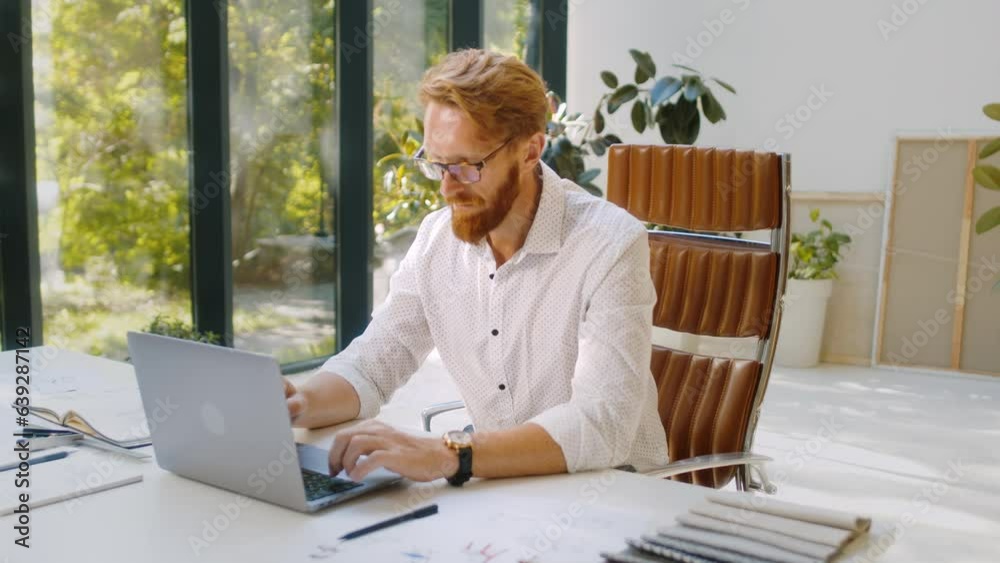 Designer using laptop for making sketch of new furniture Designer using laptop for making sketch of new furniture