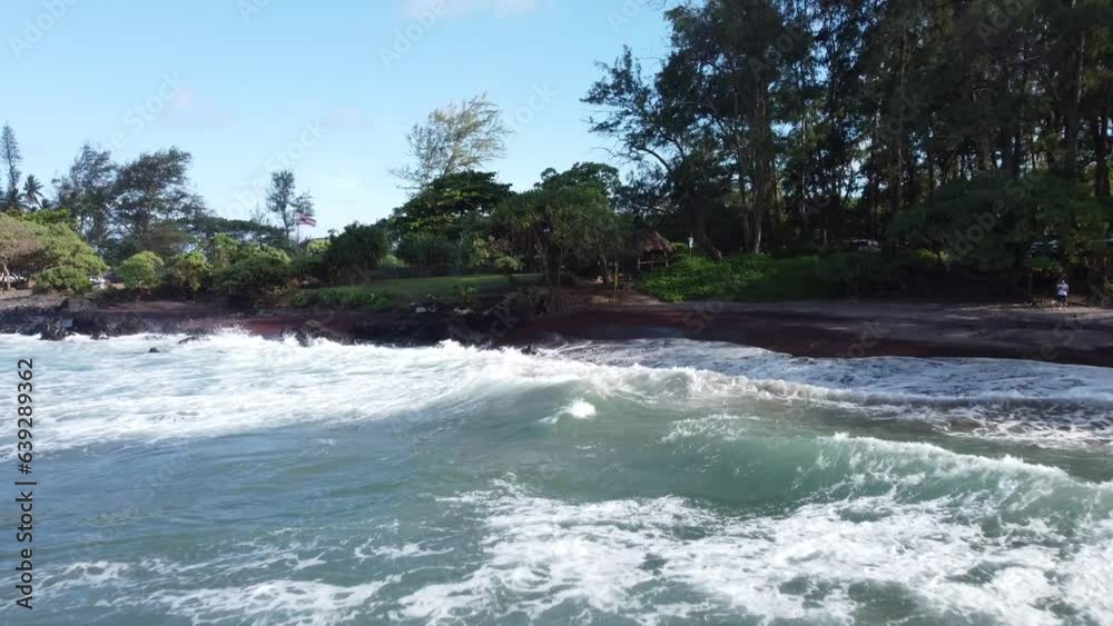 Waves hitting the beach in Maui, Hawaii Waves hitting the beach in Maui, Hawaii