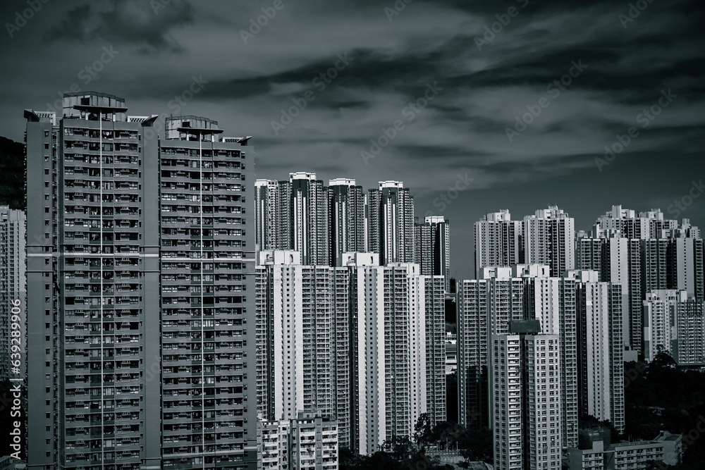 Monochrome photographs depicting the reality of Hong Kong-style public housing estates.