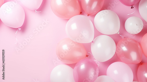 Balloons on pastel pink background. Frame made of white and pink balloons. Birthday, holiday concept. Flat lay, top view, copy space