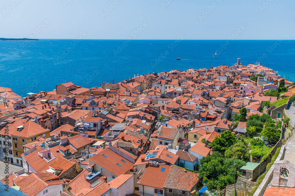 A view down the promontory from the cathedral tower in the town of Piran, Slovenia in summertime