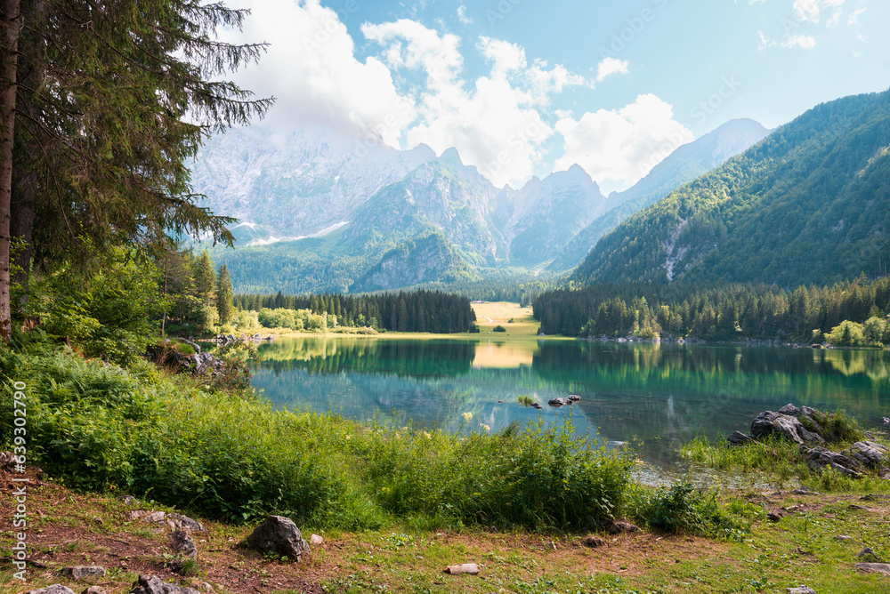 Sunrise view on Bernese range above Bachalpsee lake. Peaks Eiger, Jungfrau, Faulhorn in famous location in Switzerland alps, Grindelwald valley. High quality photo