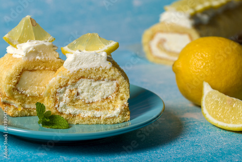 Lemon roll with fruit curd, with mint, close-up