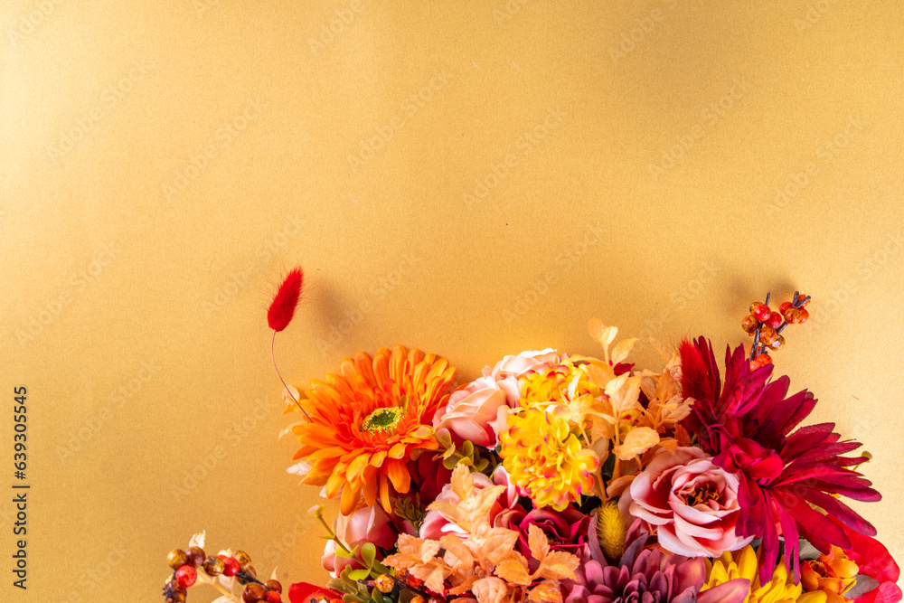 Autumn holidays greeting card background. Autumn red, orange, bright flowers and leaves a big bouquet on white gold background. Teacher's Day, Thanksgiving Day, Halloween background