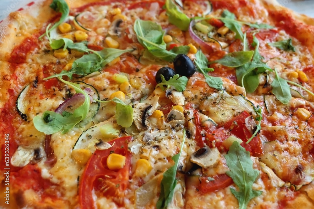 Vegetarian pizza with seasonal vegetable. Selective focus, close-up. Vegetarian pizza with seasonal vegetable. Selective focus, close-up.