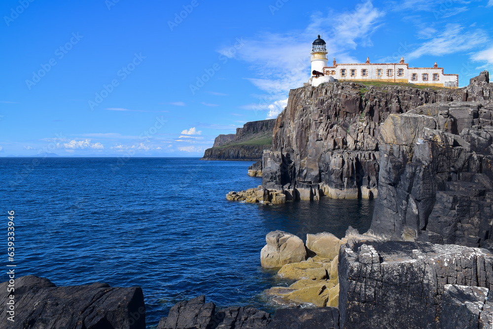 Neist Point Lighthouse high on basalt rock cliffs, Isle of Skye, Scotland