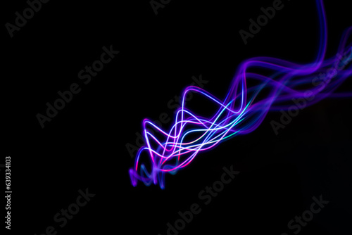 Neon design elements lights glow and flash technology abstract background. High quality photo