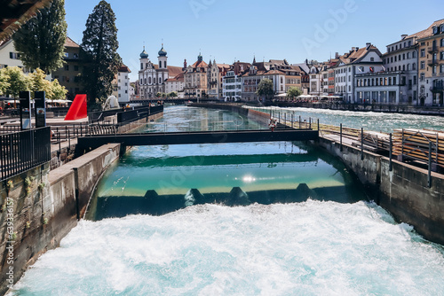 Needle dam in the Reuss in Lucerne, Switzerland. A needle dam is a weir designed to maintain the level or flow of a river through the use of thin "needles" of wood.