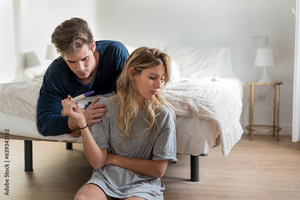 Young couple scared after pregnancy test result Young couple scared after pregnancy test result