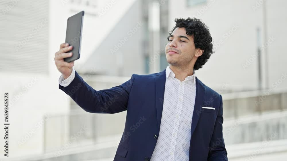 Young latin man business worker smiling confident make selfie by touchpad at street Young latin man business worker smiling confident make selfie by touchpad at street