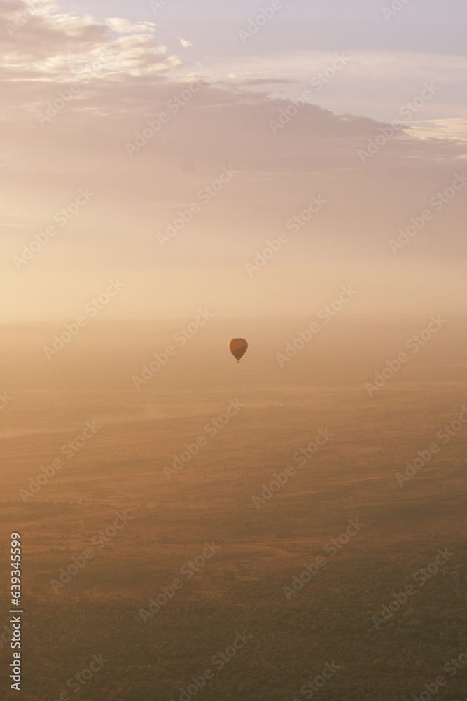Hot air balloon at dawn over the Red Centre of Australia, Northern Territory
