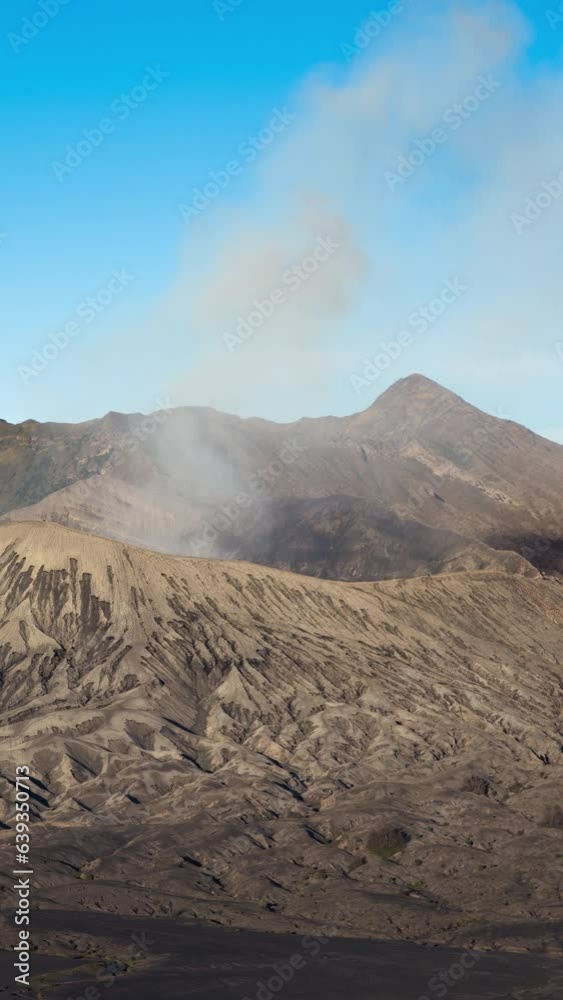 Vertical video - Timelapse of smoke emitting from Mount Bromo crater
