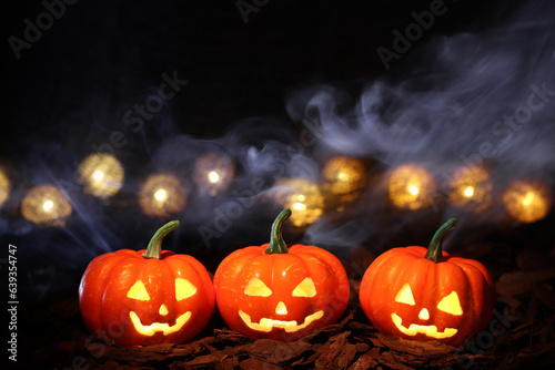 Halloween pumpkins with lights and smoke