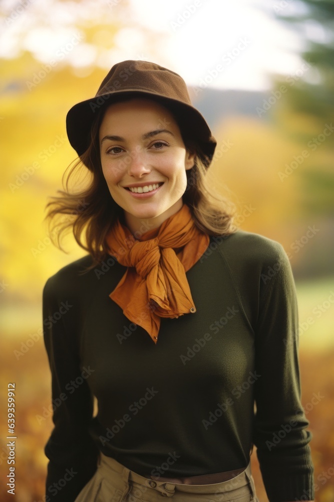 A young woman stands tall, radiating beauty and confidence in her autumn fashion of a hat, scarf, and shawl, creating a timeless portrait of joy and optimism A young woman stands tall, radiating beauty and confidence in her autumn fashion of a hat, scarf, and shawl, creating a timeless portrait of joy and optimism