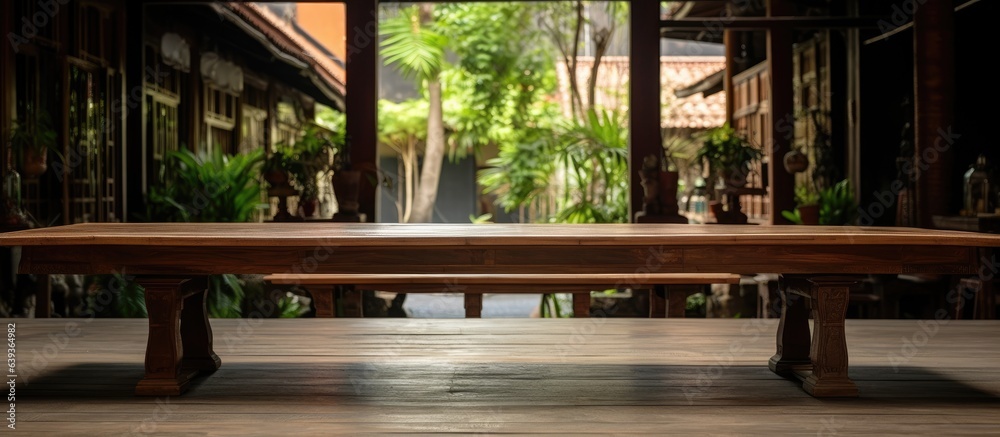 Malang restaurant features a lengthy wooden table