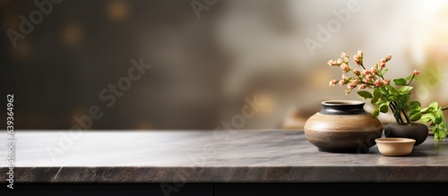 Stone tabletop with blurry kitchen background suitable for product display or montage