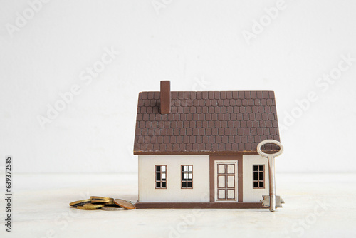 House figure with money and...