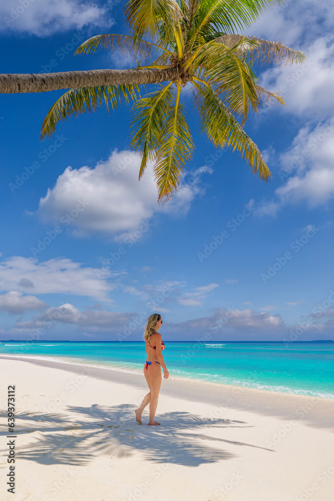 Beautiful carefree woman bikini suntan sunbathing, ocean tropical coast. Palm tree shadow on closeup sandy beach. Travel vacation paradise panoramic banner blue sea sky. Happy leisure summer lifestyle Beautiful carefree woman bikini suntan sunbathing, ocean tropical coast. Palm tree shadow on closeup sandy beach. Travel vacation paradise panoramic banner blue sea sky. Happy leisure summer lifestyle