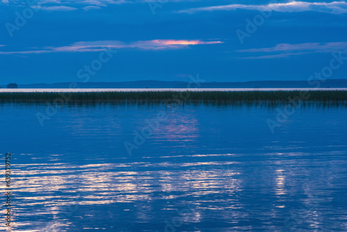 natural landscape, white night over the wide northern lake