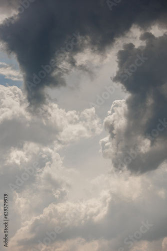 white storm clouds in sky background of nature. weather and climatic conditions, ecology. view of clouds from airplane window. Flight and freedom are religion. The top of sky and atmosphere, solar