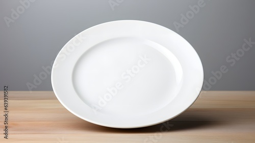 small and simple plate on a table, white background